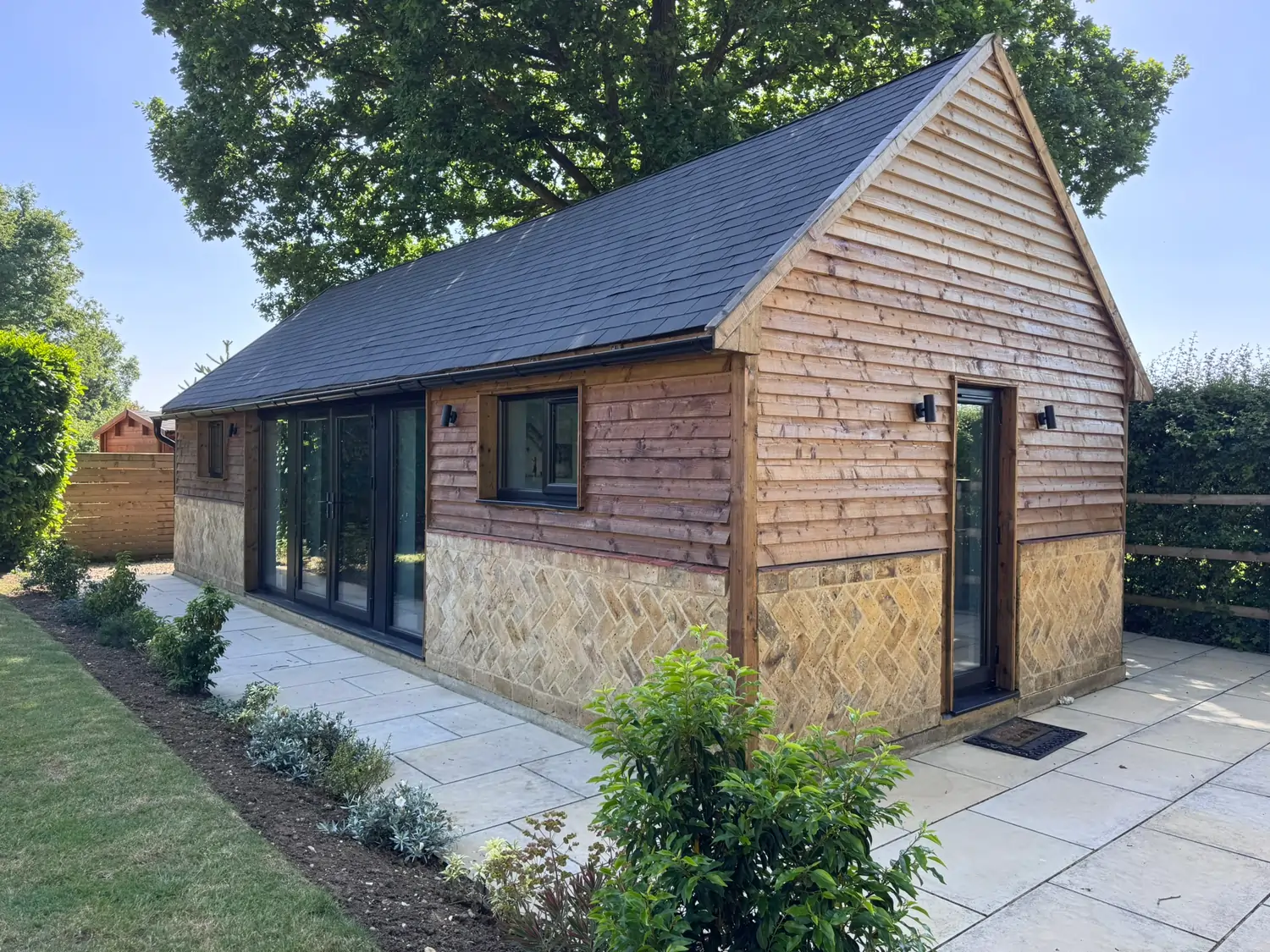 Contemporary bespoke garden room designed and built by Quarters Projects